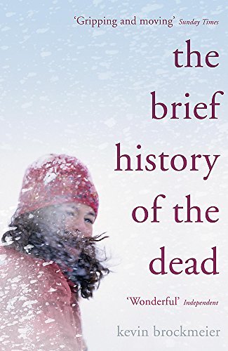 Book cover: a bearded person in a red hat against a snowy background.