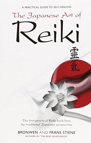 Book cover with a white lotus flower and a red circular stone.