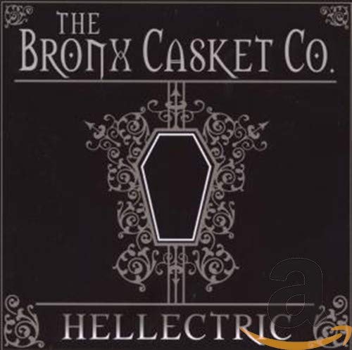 Black album cover with ornate silver casket design and band name.