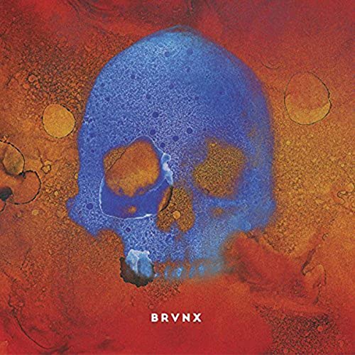 CD cover with a textured blue skull on a red background.
