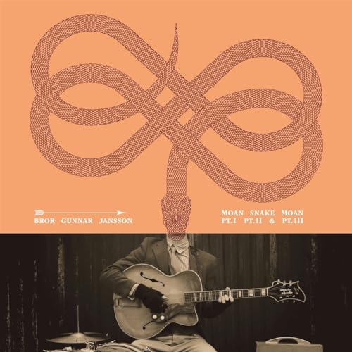Album cover: snake illustration above a guitarist in a suit.