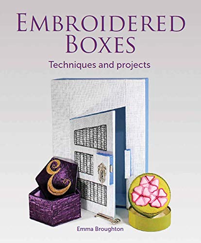 Book cover featuring embroidered boxes with floral and architectural designs.