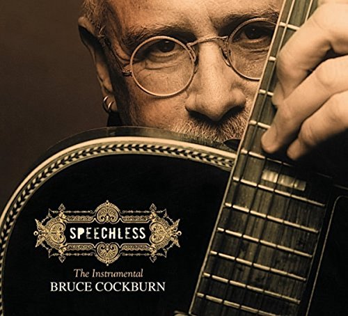 Bruce Cockburn album cover, close-up of musician with guitar.