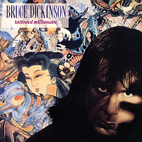 Vinyl album cover with a man's face and tattooed woman artwork.