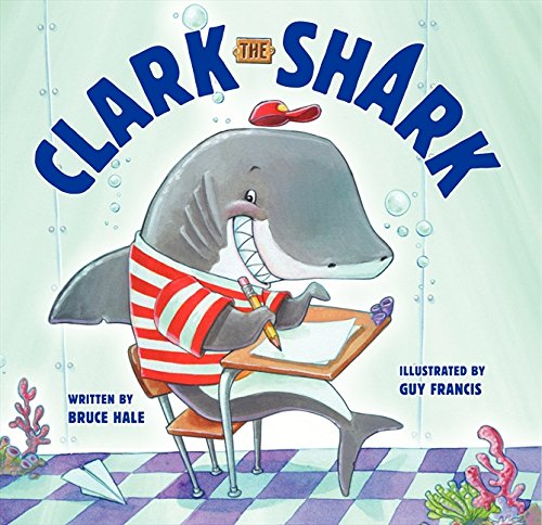 Cartoon shark with red cap holding a pencil at a school desk.