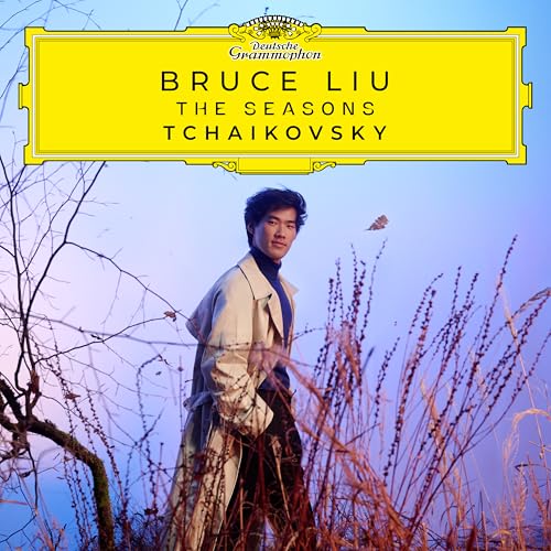 CD cover featuring pianist Bruce Liu amidst winter brush, yellow banner.