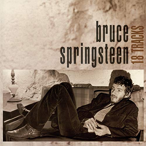 Bruce Springsteen album cover, sepia tone, man reclining on a couch.