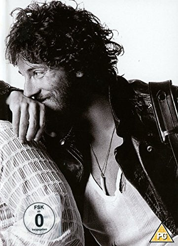 Black and white portrait of Bruce Springsteen with a leather jacket.
