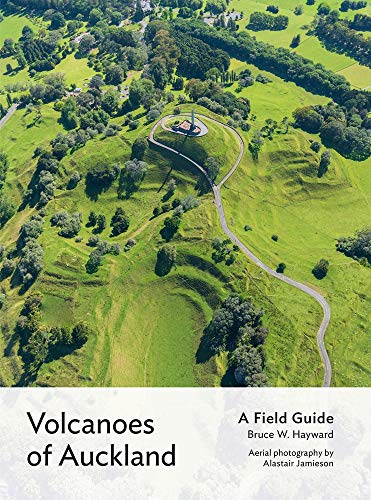 Book cover: aerial view of a green volcanic cone with a winding road.