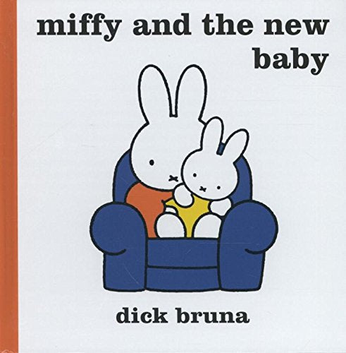 Miffy and a small rabbit sit embracing on a blue armchair.