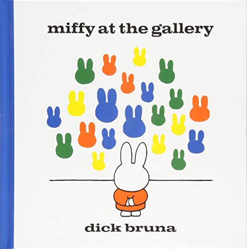 Miffy stands before a wall displaying many colorful rabbit-shaped paintings on a white background.