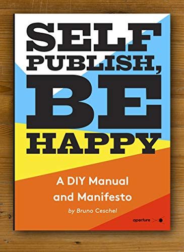 Book cover with bold text: "Self Publish, Be Happy" and color blocks.