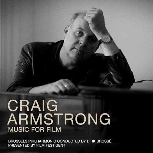Black and white portrait of Craig Armstrong with piano and text.