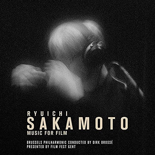 CD cover: black and white portrait of Ryuichi Sakamoto, text details.