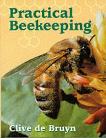 Book with bee and hive illustrations, on beekeeping, with protective wear on cover.