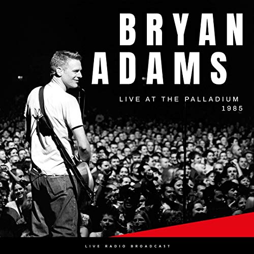 Bryan Adams performing live on stage with a crowd, 1985 vinyl album.
