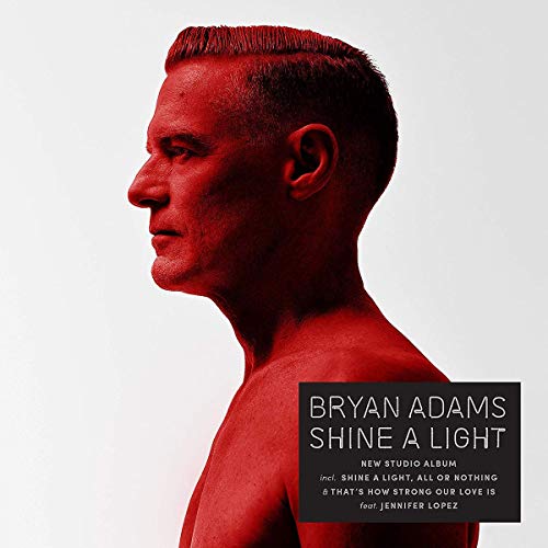 Red-toned portrait of Bryan Adams, album cover for "Shine A Light".