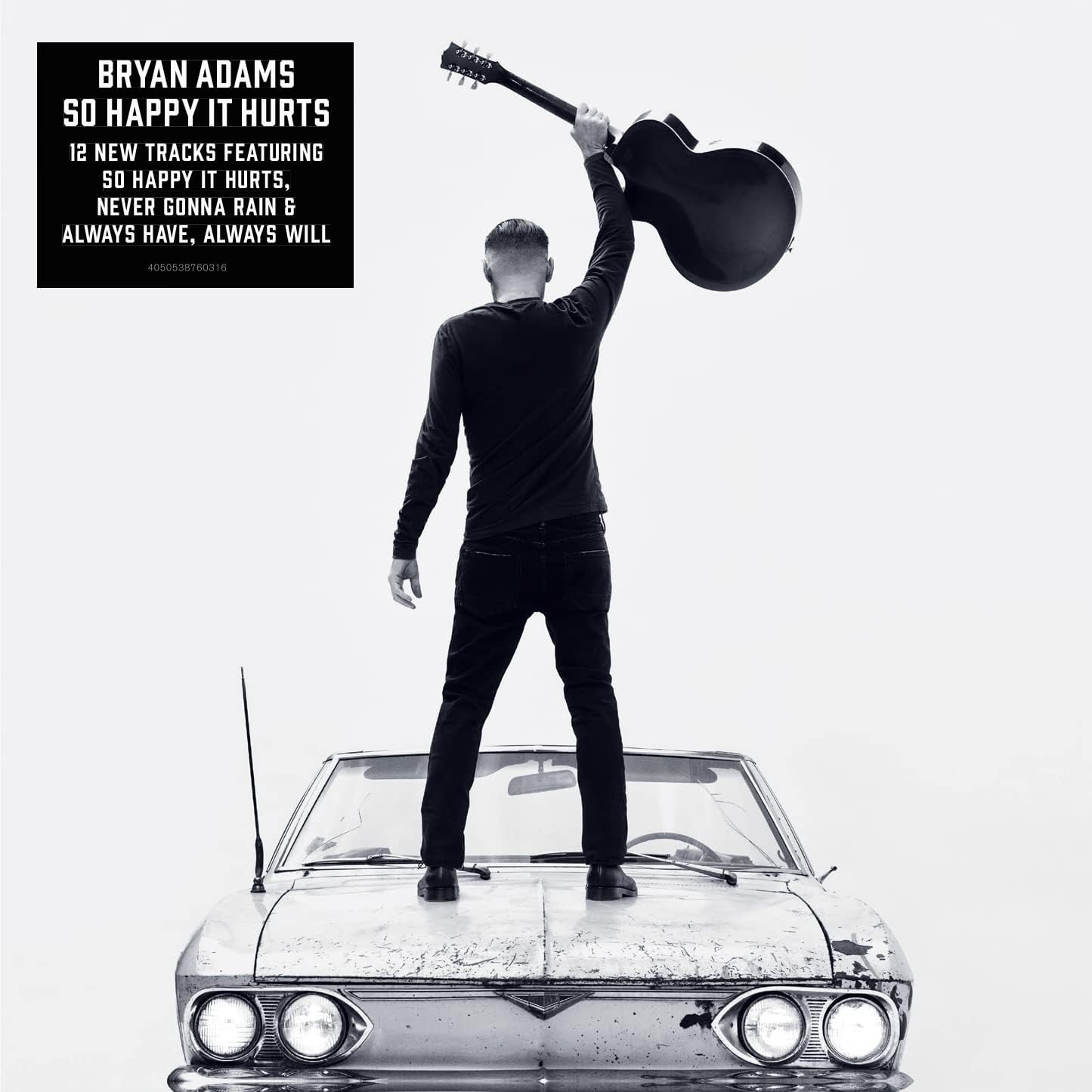 Bryan Adams album cover: man with guitar and classic car.