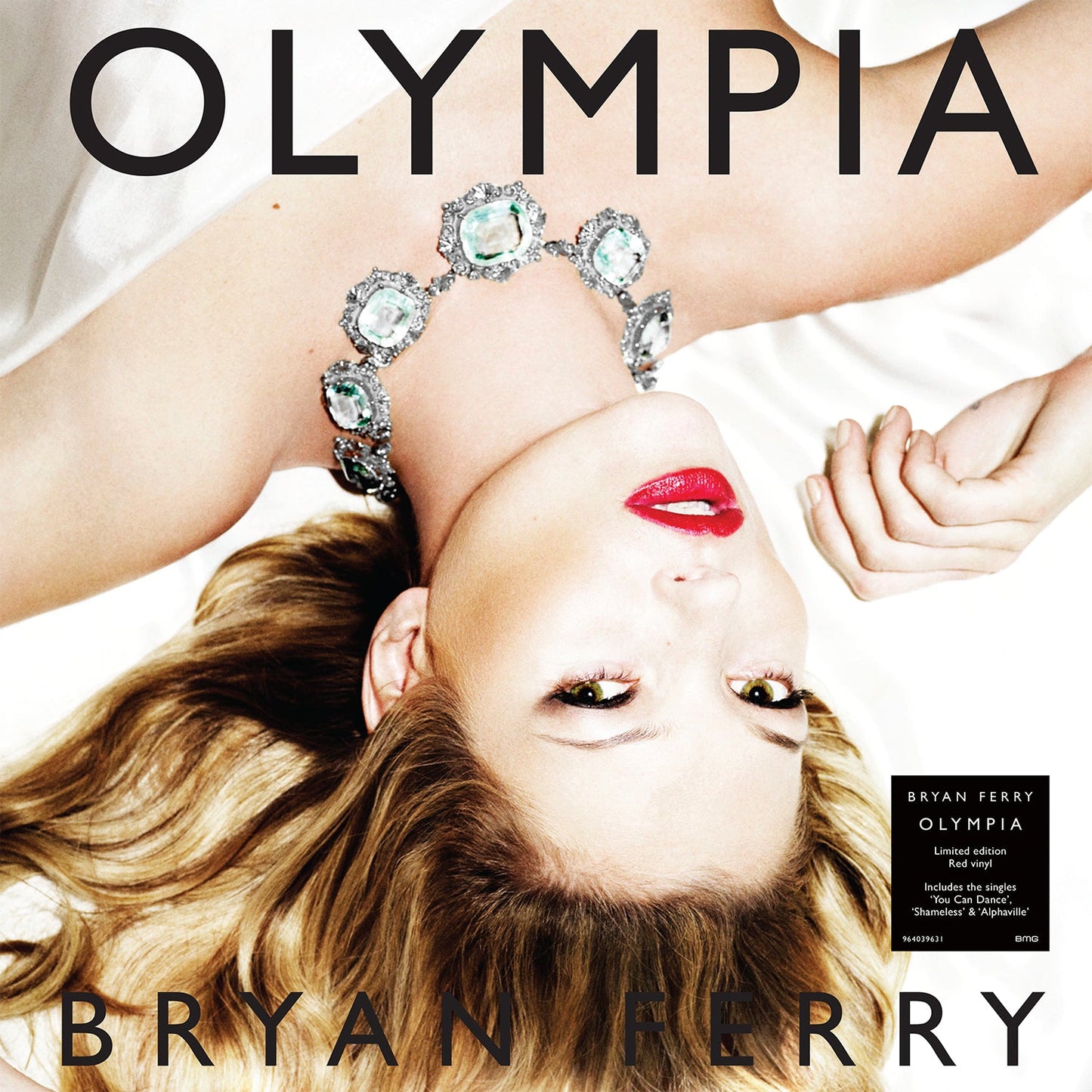 Album cover showing a woman with blonde hair wearing a jeweled necklace.