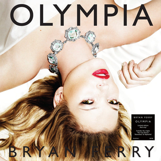 Album cover showing a woman with blonde hair wearing a jeweled necklace.