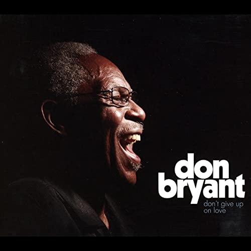 Close-up portrait of Don Bryant smiling, album cover for "Don't Give Up On Love.