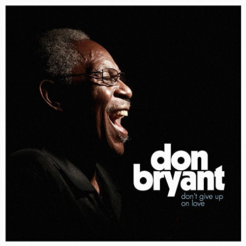 "Vinyl album cover featuring a man singing, with artist name and album title."