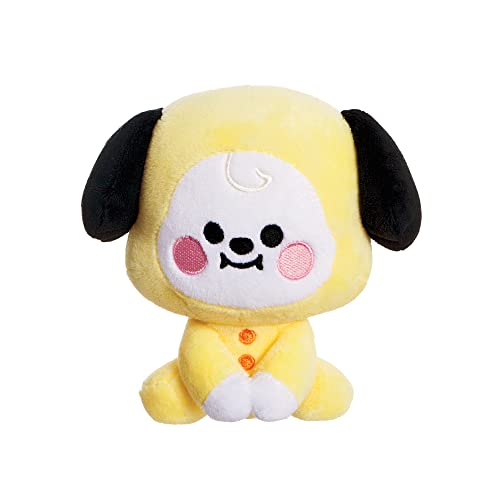 A small yellow BT21 Chimmy plush toy with black ears and pink cheeks.