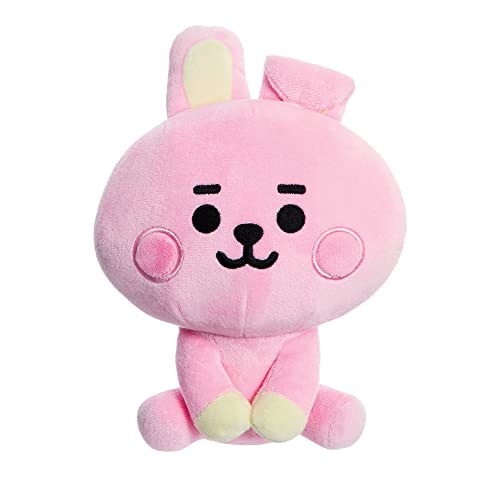 Pink BT21 Cooky plush toy with a simple, cartoon-like face.