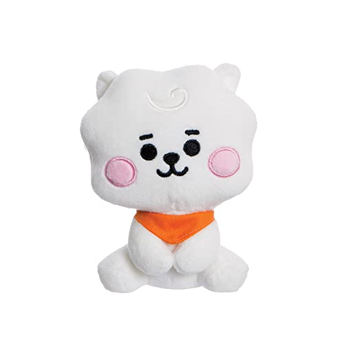 White plush toy of RJ, a BT21 character resembling a bear, with orange scarf.