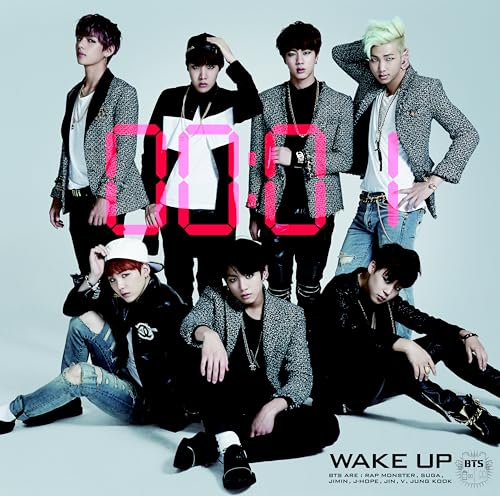 Seven members of BTS posing against a light background with large pink digital numbers.