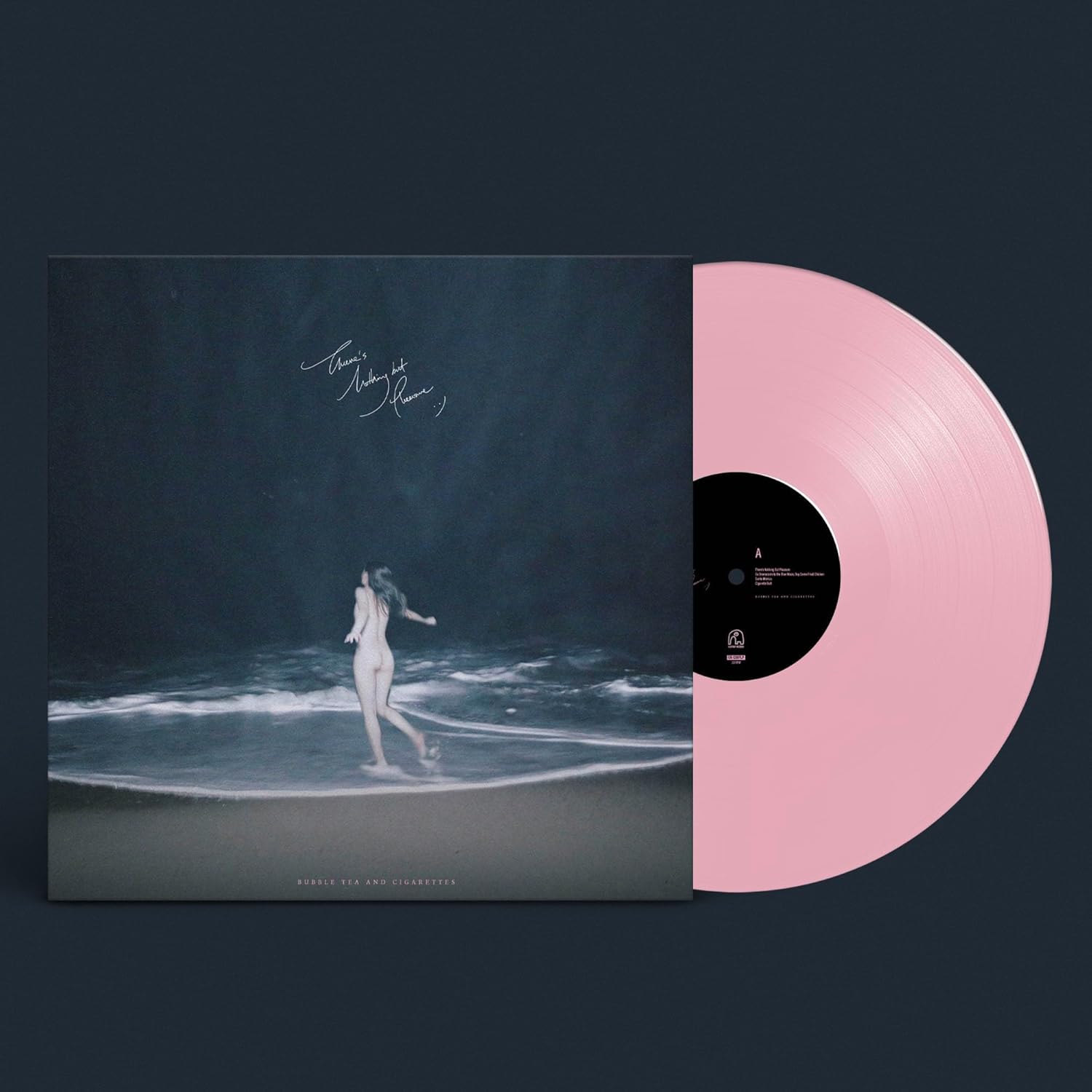 Pink vinyl record with a woman walking on a beach scene.