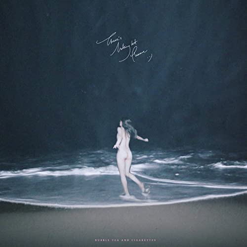 CD cover: nude figure walking towards the ocean in dark waves.