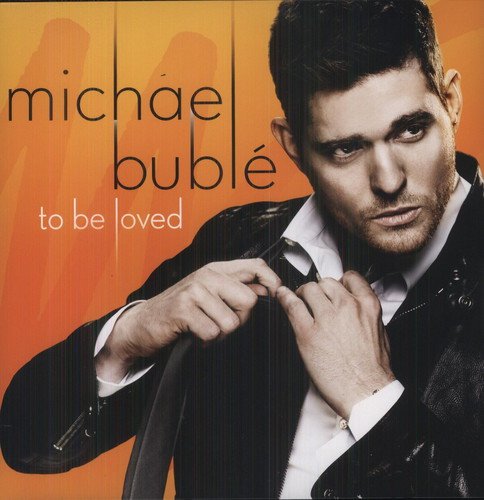Michael Bublé album cover featuring a man in a leather jacket against an orange background.