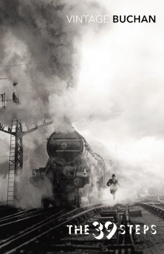 Book cover: a man runs alongside a steam train in fog.