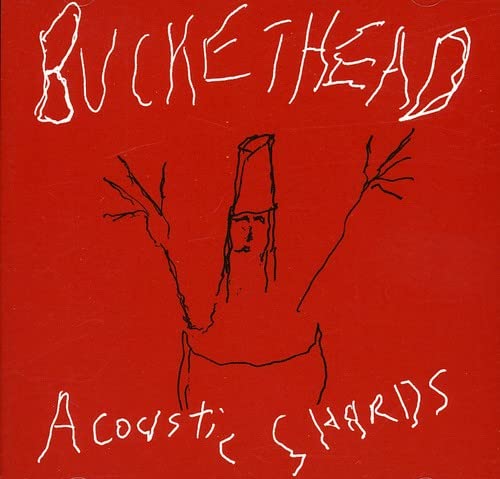 Red album cover with a rough, black-line drawing of a figure with a bucket head.