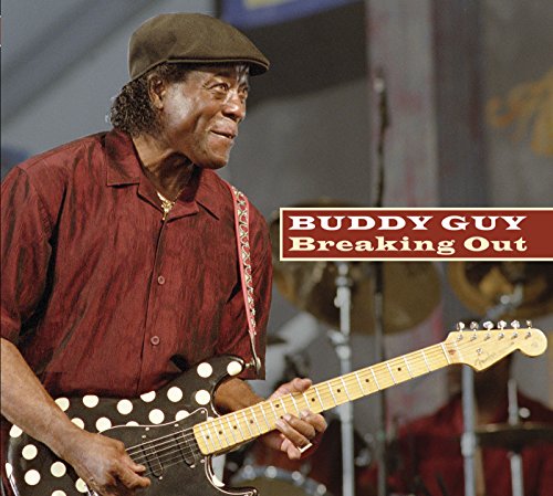"CD cover of Buddy Guy's 'Breaking Out' featuring the artist playing guitar on stage."