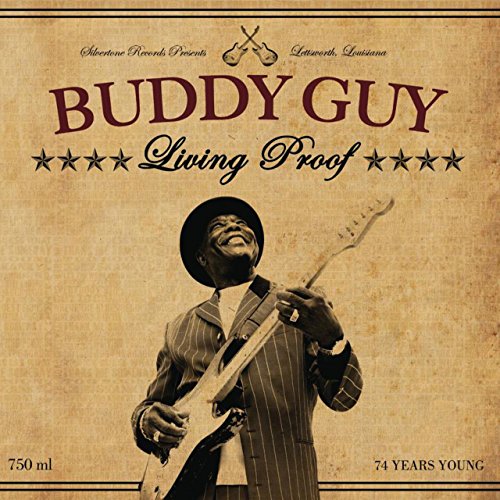 "Vinyl album cover featuring Buddy Guy playing guitar, sepia-toned, with 'Living Proof' title."