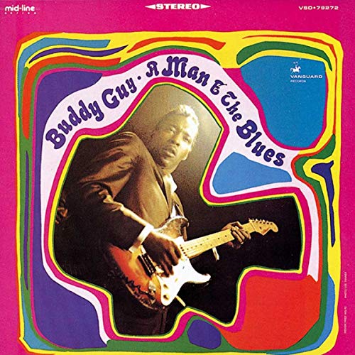 Buddy Guy playing an electric guitar against a colorful, wavy psychedelic border.