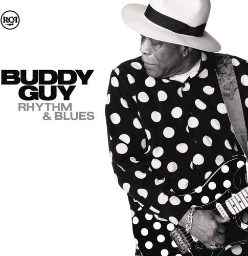 Buddy Guy wearing a hat and polka dot shirt, holding a guitar, album cover art.