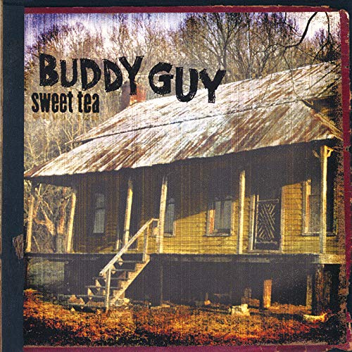 Album cover featuring a weathered yellow wooden house with a metal roof.