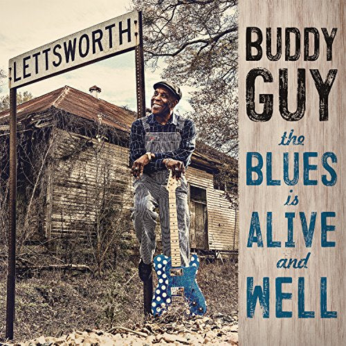 Buddy Guy album cover featuring the blues musician with a guitar.