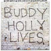 Buddy Holly album cover with graffiti-style lettering on a brick wall.