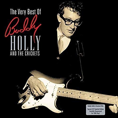 Buddy Holly album cover: black and white photo of Holly with guitar.