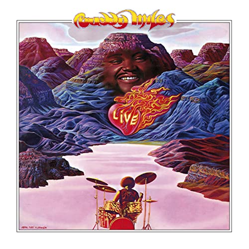 Album cover: Buddy Miles’ face superimposed on a desert landscape with drums.