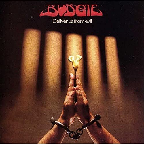 CD cover: hands holding a flower, restrained by handcuffs.
