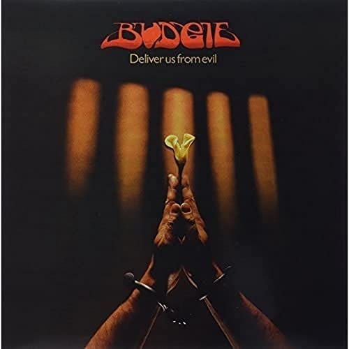 Vinyl record cover: "Budgie - Deliver Us From Evil" with hands and flower.
