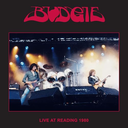Budgie band performing live on stage at Reading Festival, 1980.
