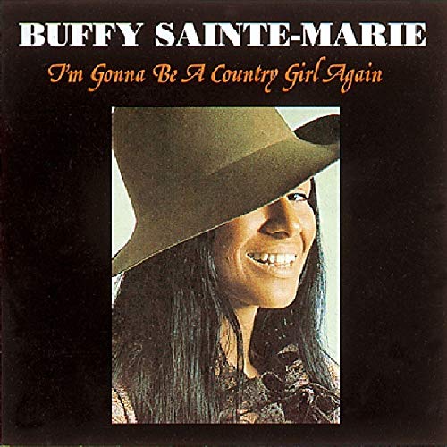 Buffy Sainte-Marie album cover, woman in a cowboy hat smiling.