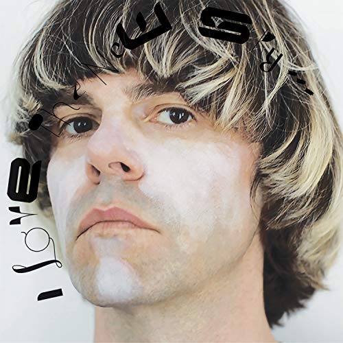 Portrait of Tim Burgess with abstract text and musical notes overlayed.