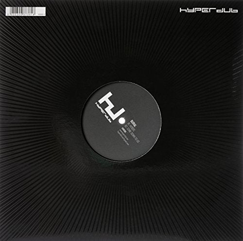 Black vinyl record with white label and radiating line pattern.